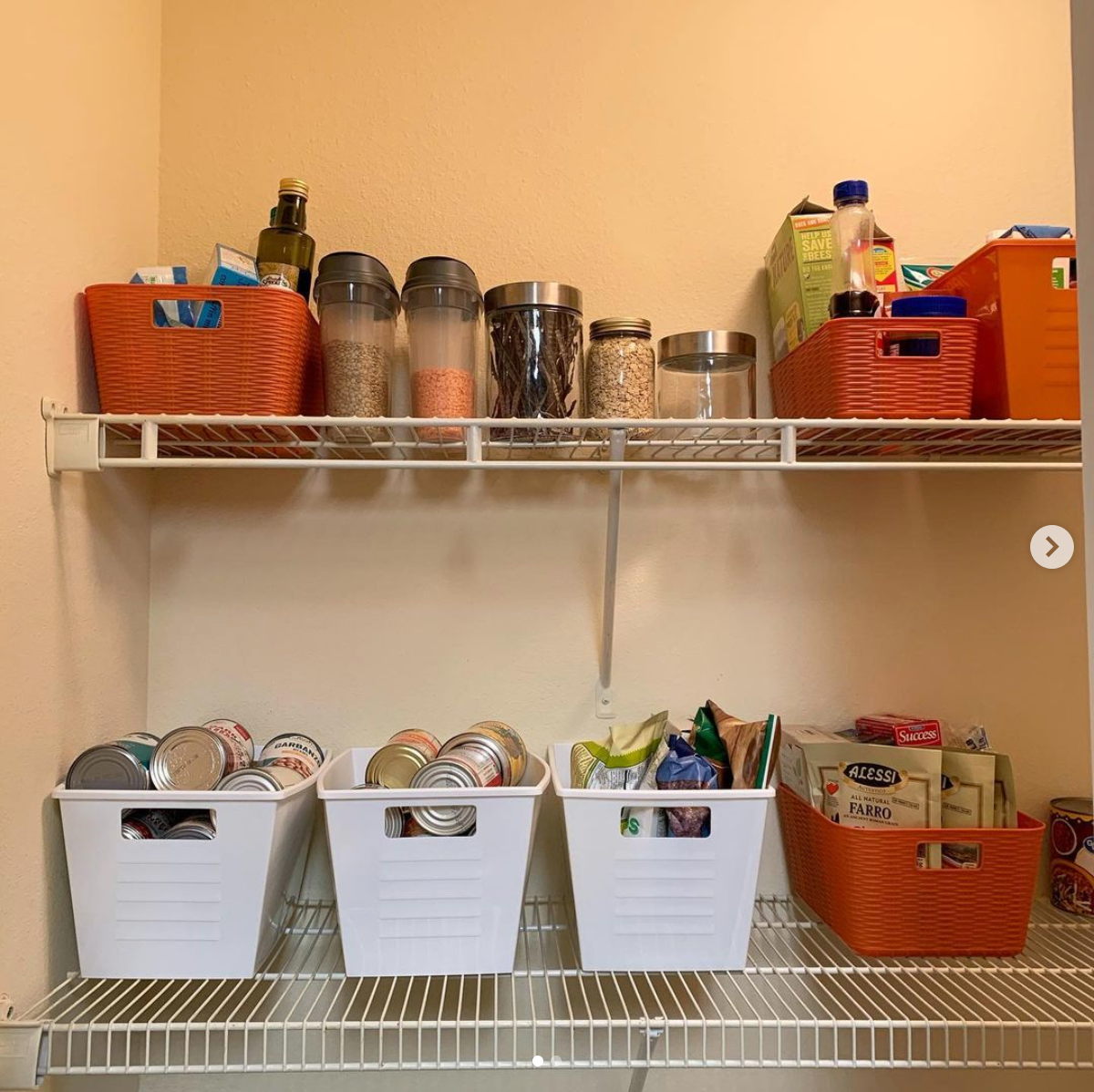 Pantry organized into bins and jars