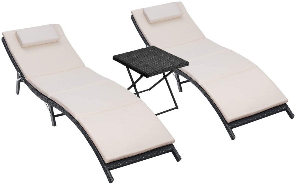 Modern and streamlined black metal chaise loungers with sophisticated cream cushions