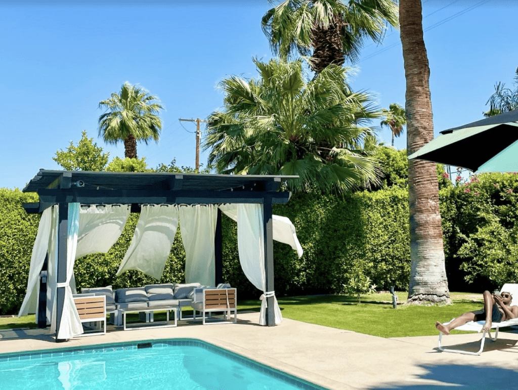 Palm springs airbnb backyard with pool and cabana