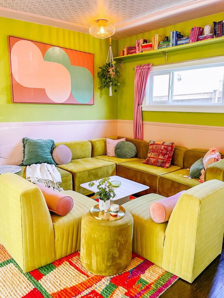 Dani Dazey project photo - living room with lime green velvet couches, lime green walls, and colorful details