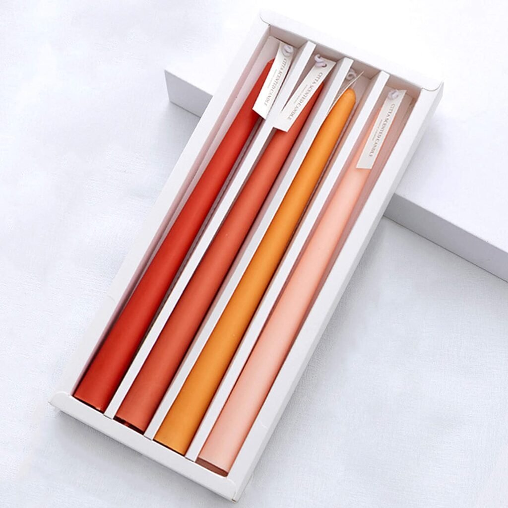 Red, rust, orange, and peach colored candlesticks