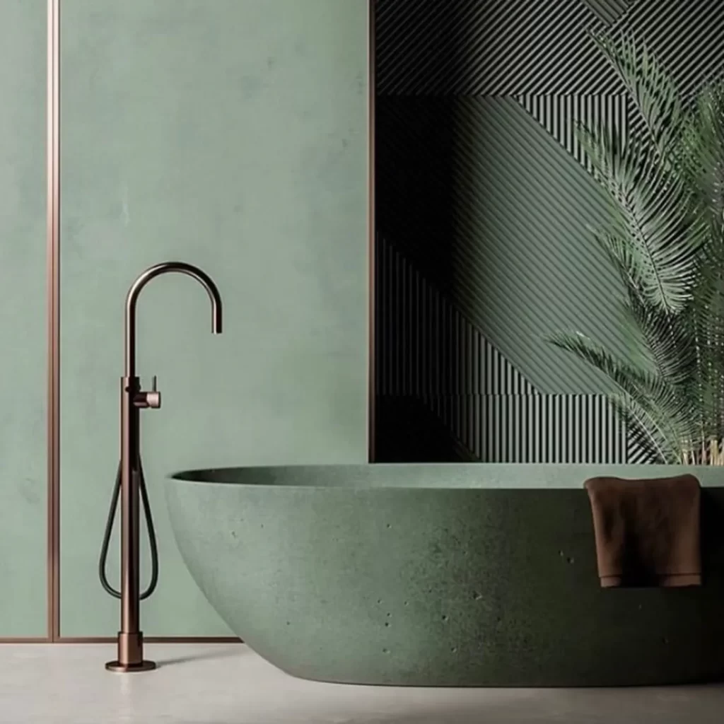 Green monochromatic bathroom with textural minimalism design and copper accents