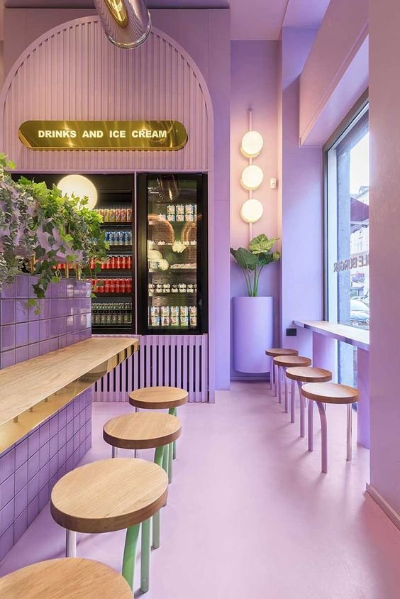 Commercial interior design - ice cream shop with pastel purple walls and floors
