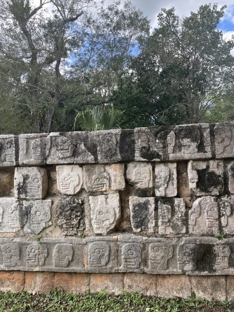 Wall of Chichen Itza representing the human sacrifice when the Toltecs took over the city
