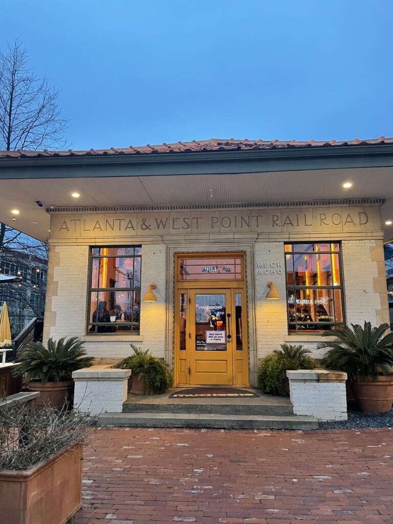 Exterior of Muchacho restaurant in the historical Atlanta & West Point Railroad building