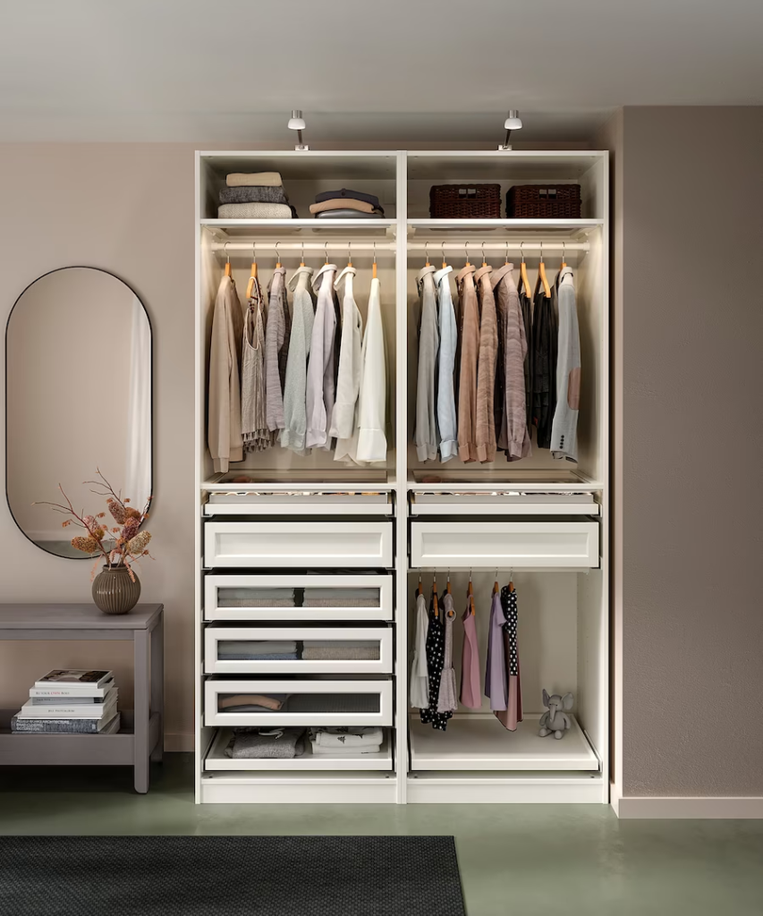 Ikea Pax wardrobe arrangement with white drawers and racks. Green shiny floor, taupe walls and subtle boho/scandinavian details