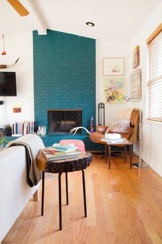 Brick fireplace painted teal