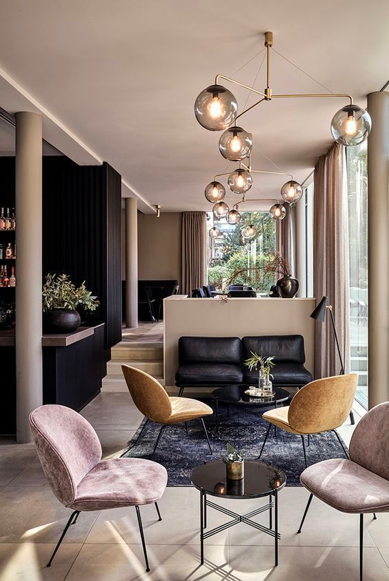 luxurious living room with elevated lighting and velvet accents