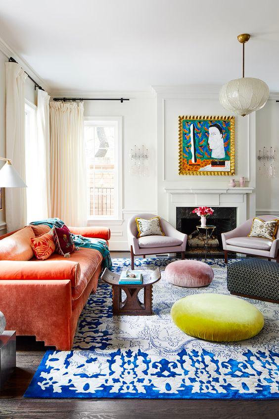 colorful and eclectic living room with two matching accent chairs
