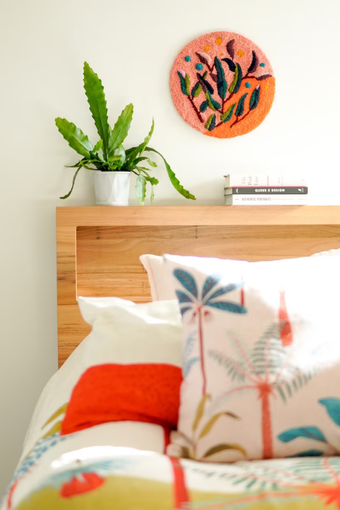 Colorful decorative throw pillows on a bed