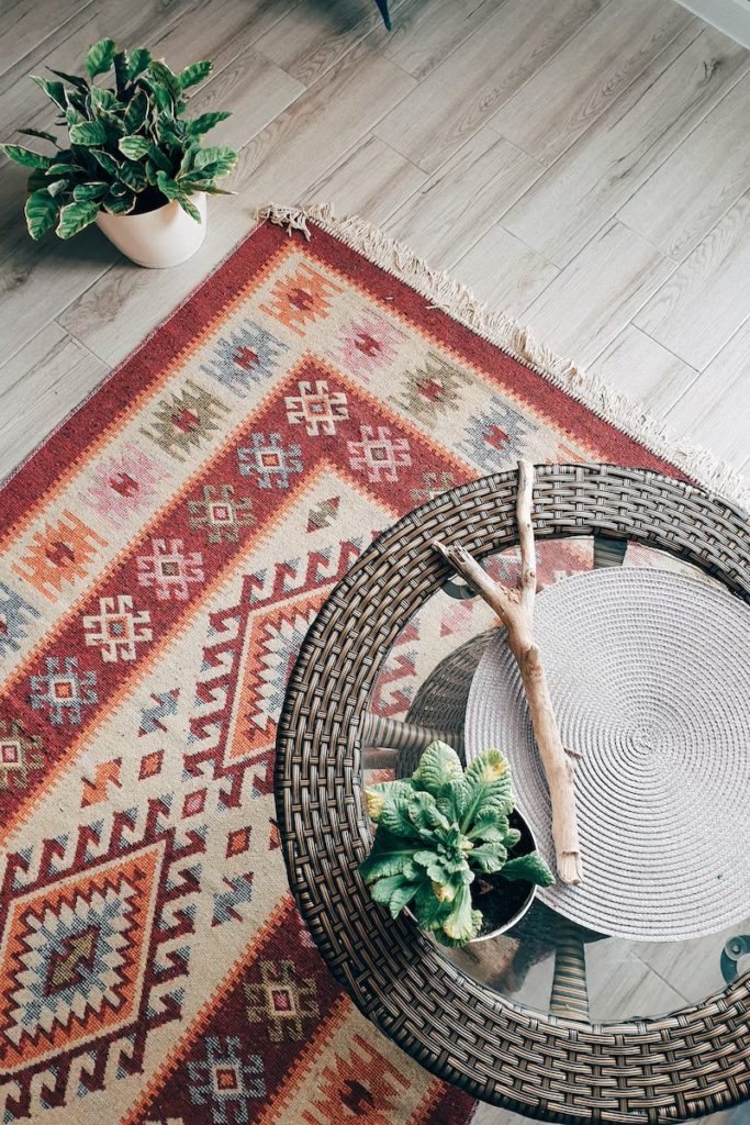 rugs are a great way to revamp your living space - this is a picture of a colorful bohemian/southwestern rug